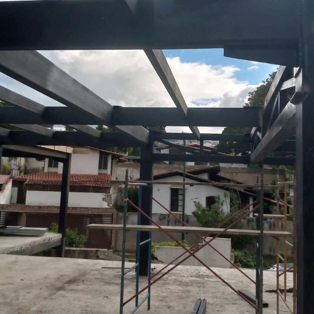 Black steel beams erected on a residential job