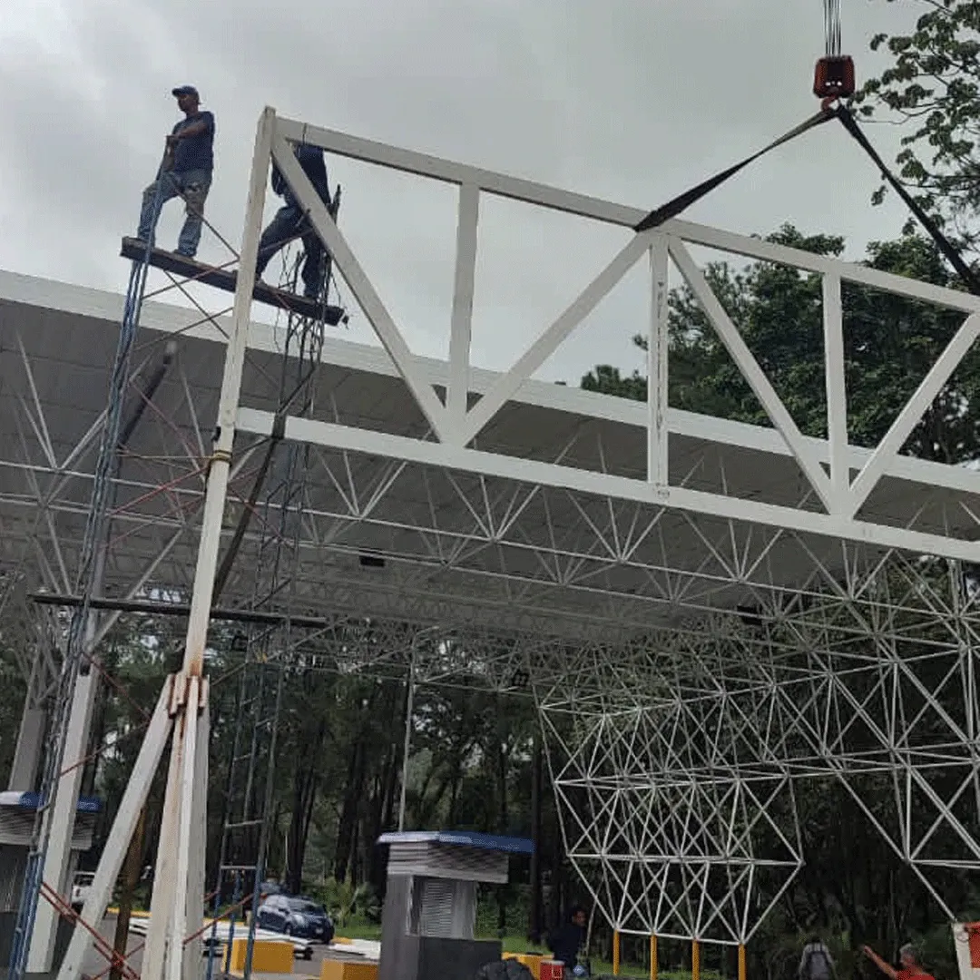 Section lifted by crane, with the crew up top.